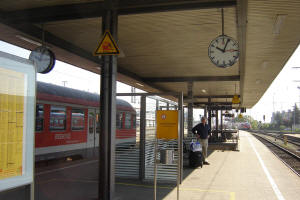 Train platforms were often open-air in the smaller stations. Clocks were always prominently displayed. The trains arrived and departed "like clockwork."
